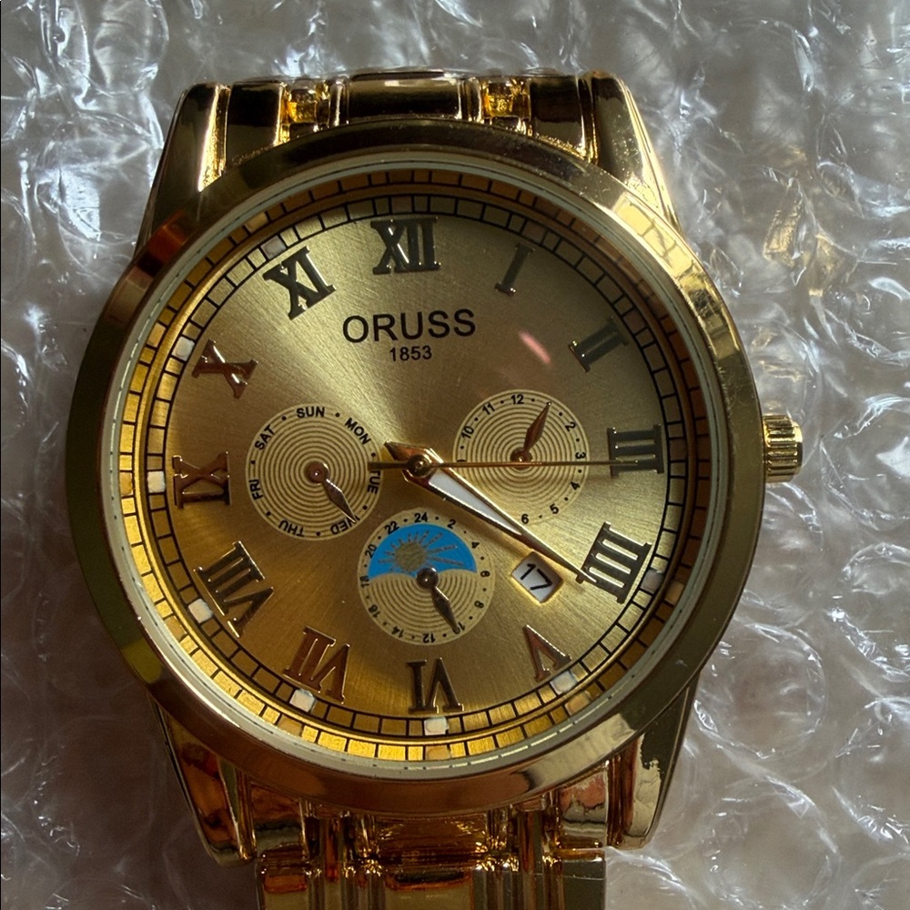 ORUSS Gold Watch with Black Accents